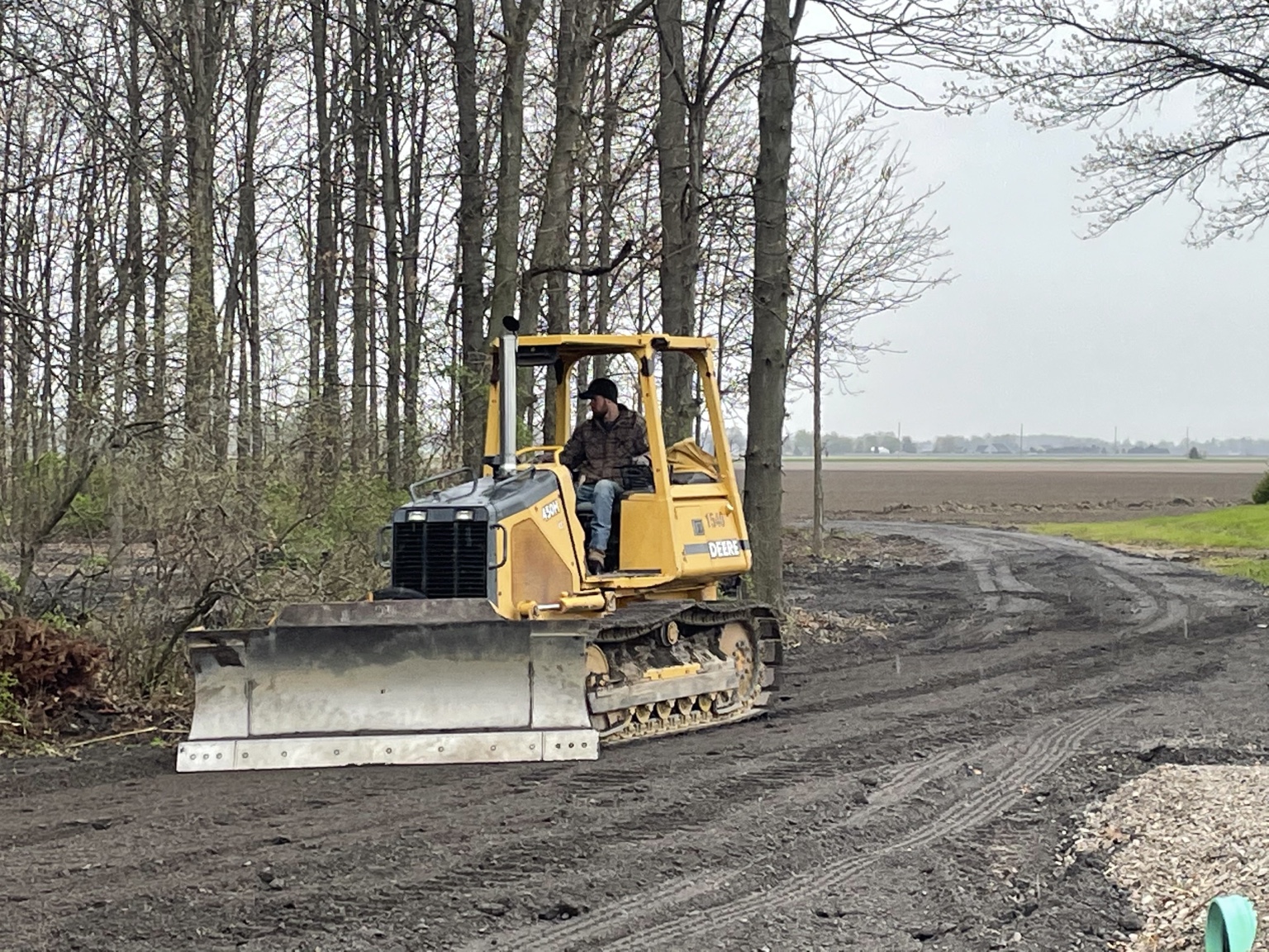 Dozer shaping and grading an access drive